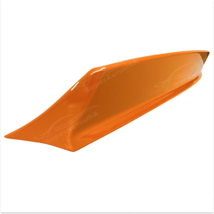 Dynamic angle showing the WRX STI with its Paint Matched Solar Orange Pearl Duckbill Rear Spoiler, blending performance with vibrant aesthetics.