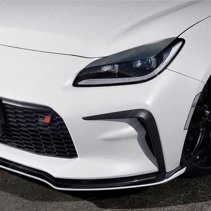 Sleek Real Carbon Fiber Headlight Eyelids Set for 2024 Toyota GR86 by SuperAutoUSA