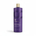 A purple bottle of Colorproof Moisture Shampoo with a metallic gold cap, centered on a clean white background.