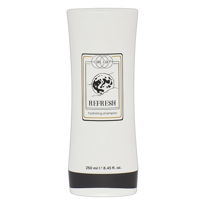 White shampoo bottle with black label on a white background