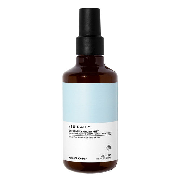 Brown spray bottle with a light blue label on a white background