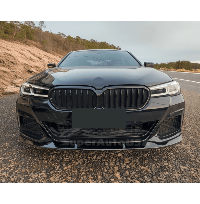 Detailed shot of the Fit 2021-2024 BMW 5 Series G30 with its Gloss Black Front Bumper Lip Spoiler, highlighting the front spoiler lip splitter's quality.