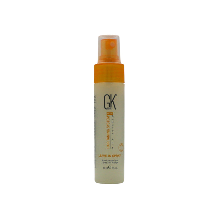 Spray bottle with orange nozzle and visible 'GK' branding on a white background