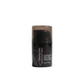 Black hair fiber product container on a white background